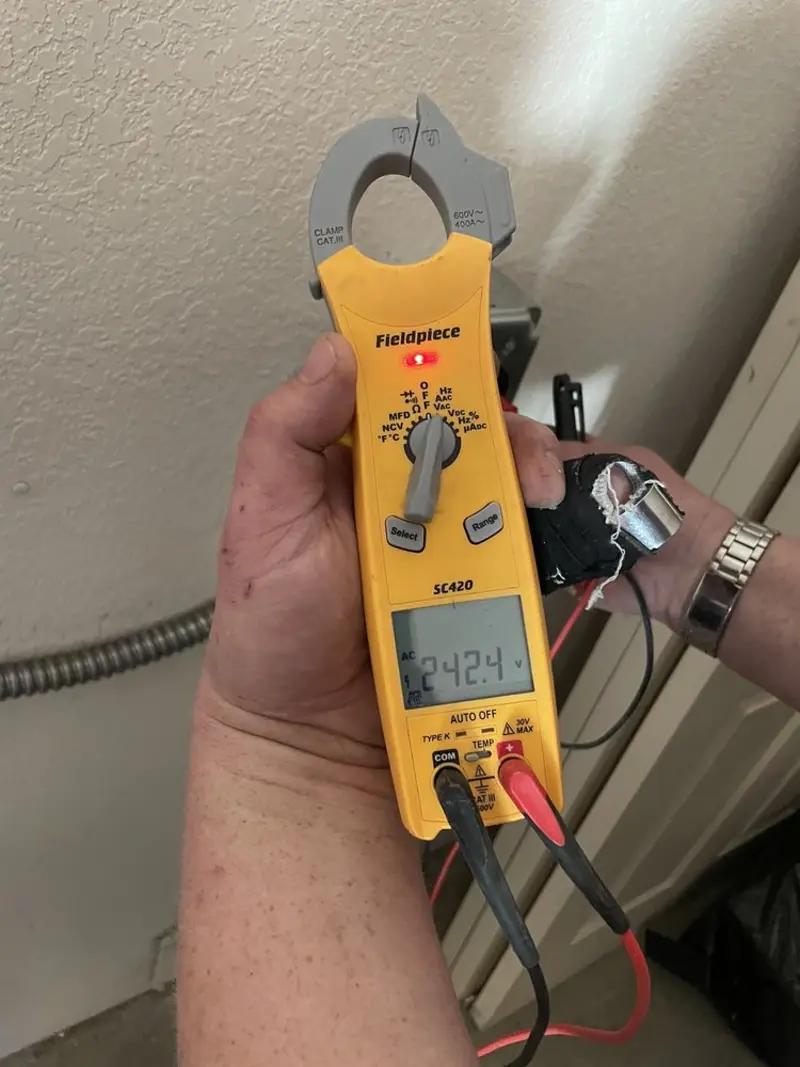 Voltage testing with clamp meter during Generator Installation in West Little River